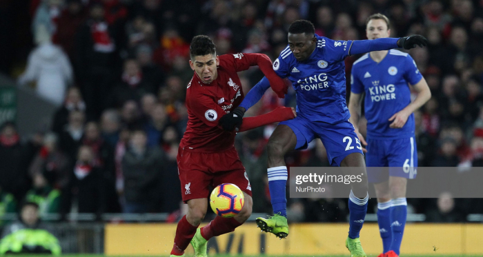 LIVERPOOL, UK. 30 JANUARY. Roberto Firmino of Liverpool battles with Wilfred Ndidi of Leicester City during the Premier League match between Liverpool and Leicester City at Anfield on January 30, 2019 in Liverpool, United Kingdom.(Photo by MI News/NurPhoto via Getty Images)
