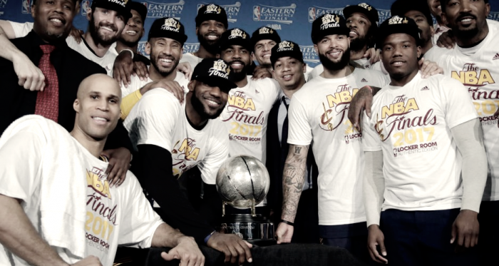 The Cleveland Cavaliers pose during their trophy presentation. Photo:AP / Elise Amendola