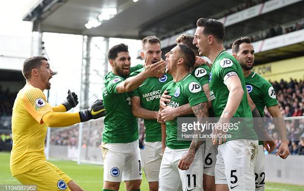 Brighton players celebrating Knockaert's winner. Image courtesy of Harriet Lander from Copa on Getty Images.