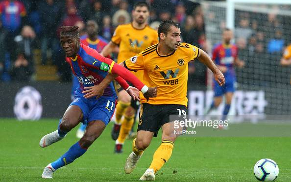 <div>Wolverhampton Wanderers Jonny holds of Crystal Palace's Wilfried Zaha during match between Crystal Palace and Wolverhampton Wanderers at Selhurst Park stadium (Photo by Action Foto Sport/NurPhoto via Getty Images)</div>