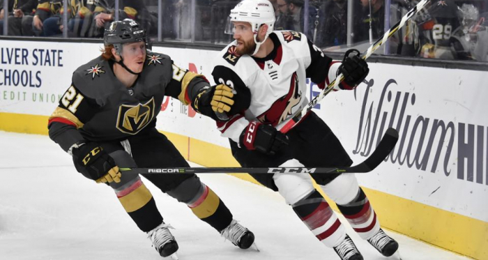 Alex Goligoski checked by Cody Eakin. The Coyotes defenseman had a solid game. (Photo: NHL.com) 