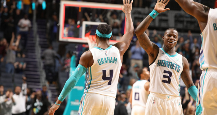 Hornets guards Devonte' Graham (left) and Terry Rozier (right) celebrate.<div>Photo via swarmandsting.com</div>