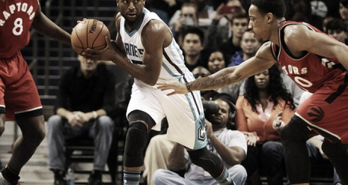 Kemba Walker (right) protects the ball vs. DeMar DeRozan (right) PHOTO: Sam Sharpe/USA Today Sports