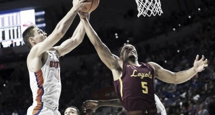 Loyola's Marques Townes and Florida's Egor Kouchelov battle for a rebound during the Ramblers' victory/Photo: Ron Irby/Associated Press