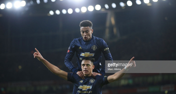 Arsenal v Manchester United - FA Cup Fourth RoundLONDON, ENGLAND - JANUARY 25: Alexis Sanchez of Manchester United celebrates scoring their 1st goal with Jesse Lingard during the FA Cup Fourth Round match between Arsenal and Manchester United at Emirates Stadium on January 25, 2019 in London, United Kingdom. (Photo by Marc Atkins/Getty Images)