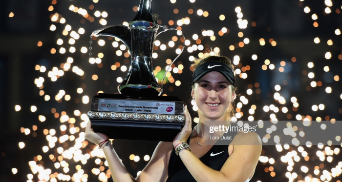 Bencic holds up the championship trophy/Photo: Tom Dulat/Getty Images