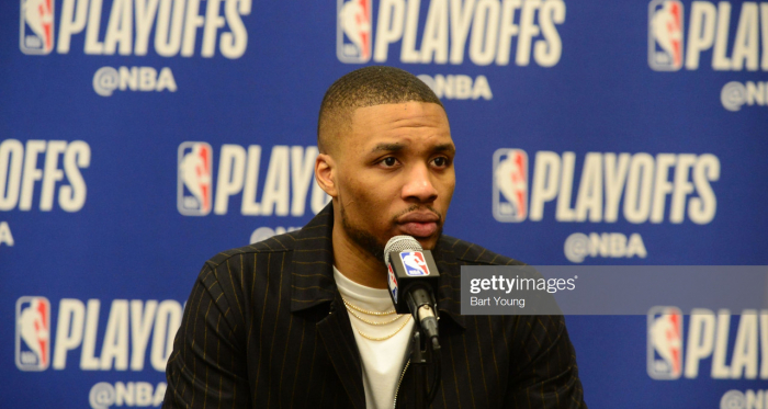 Lillard talking to the media after their Game 1 loss in Denver (Bart Young/Getty Images)