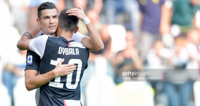 Juventus' Cristiano Ronaldo celebrates his weekend goal against S.P.A.L with teammate Paulo Dybala (Getty Images/Daniele Badolato)