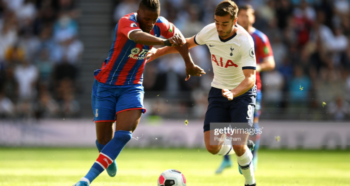<div>LONDON, ENGLAND - SEPTEMBER 14: Harry Winks of Tottenham Hotspur battles for possession with Wilfried Zaha of Crystal Palace during the Premier League match between Tottenham Hotspur and Crystal Palace at Tottenham Hotspur Stadium on September 14, 2019 in London, United Kingdom. (Photo by Paul Gilham/Getty Images)</div>