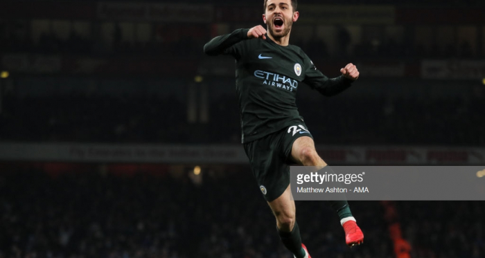 Manchester City's Bernardo Silva celebrates scoring against Arsenal at the Emirates earlier this season (Photo credit: Matthew Ashton, Getty Images)