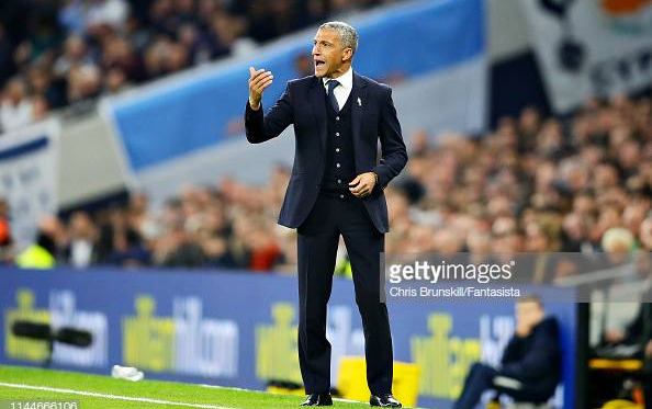 Chris Hughton on the side-line barking orders in the defeat to Tottenham. Image courtesy of Chris Brunskill from Fantasista on Getty Images.