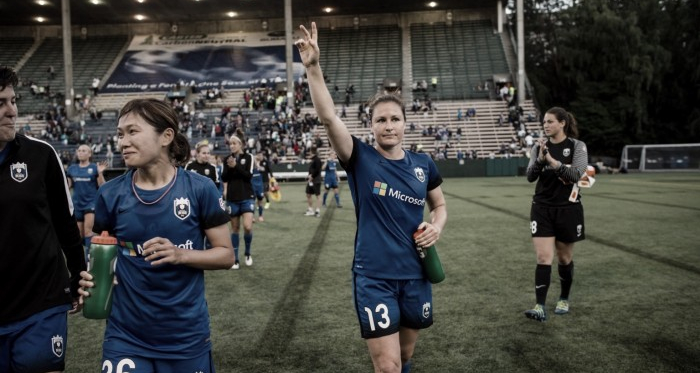 Fletcher (center) after a home game in Seattle. (Source: Seattle Reign FC)