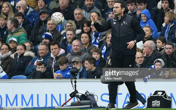Lampard in the dugout at The Amex picture courtesy of Mike Hewitt on Getty Images.