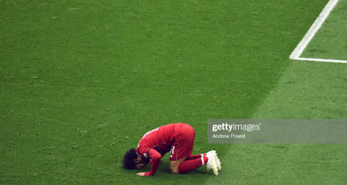 Mohamed Salah of Liverpool scores the first goal and celebrates during the Premier League match between Liverpool FC and Chelsea FC at Anfield on April 14, 2019 in Liverpool, United Kingdom. (Photo by Andrew Powell/Liverpool FC via Getty Images)
