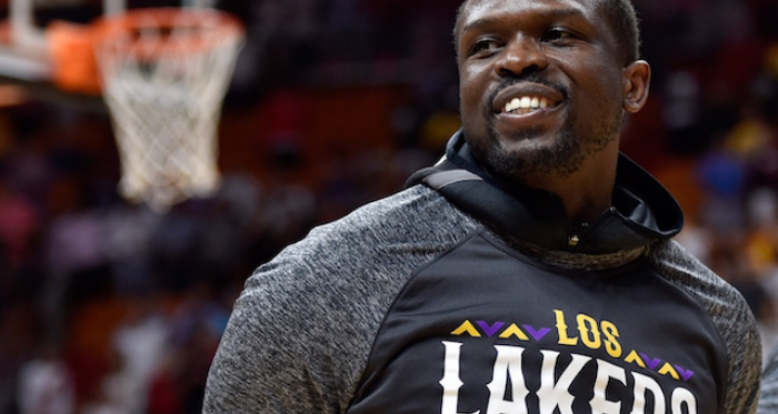 Los Angeles Lakers forward Luol Deng (9) smiles before a game against the Miami Heat at American Airlines Arena. |Steve Mitchell-USA TODAY Sports|