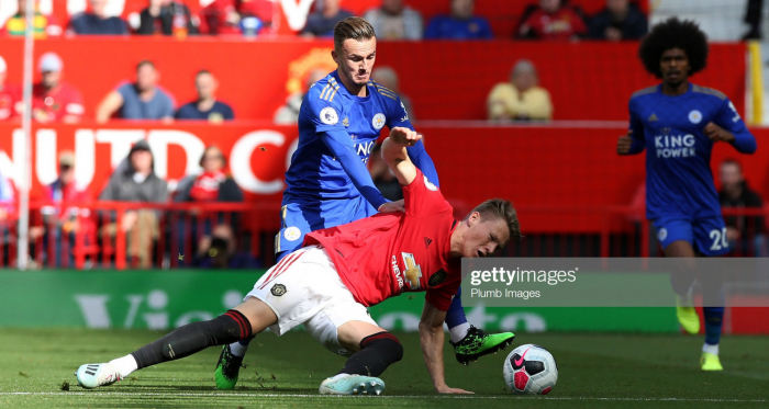MANCHESTER, ENGLAND - SEPTEMBER 14: James Maddison of Leicester City in action with Scott McTominay of Manchester United during the Premier League match between Manchester United and Leicester City at Old Trafford on September 14, 2019 in Manchester, United Kingdom. (Photo by Plumb Images/Leicester City FC via Getty Images)
