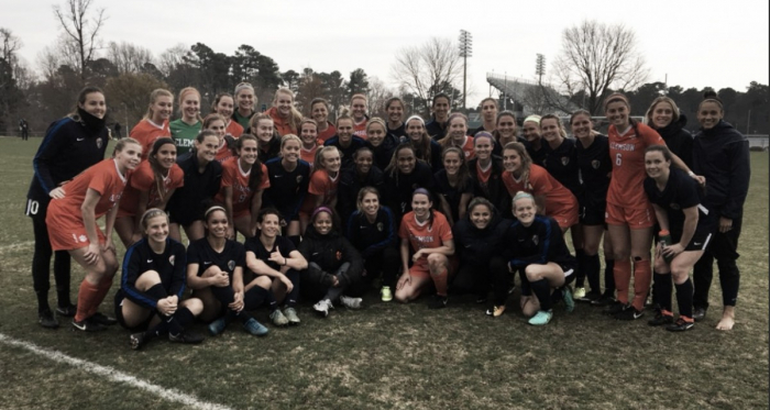 The North Carolina Courage and Clemson University players come together for a photo at their Saturday scrimmage. | Photo: @TheNCCourage