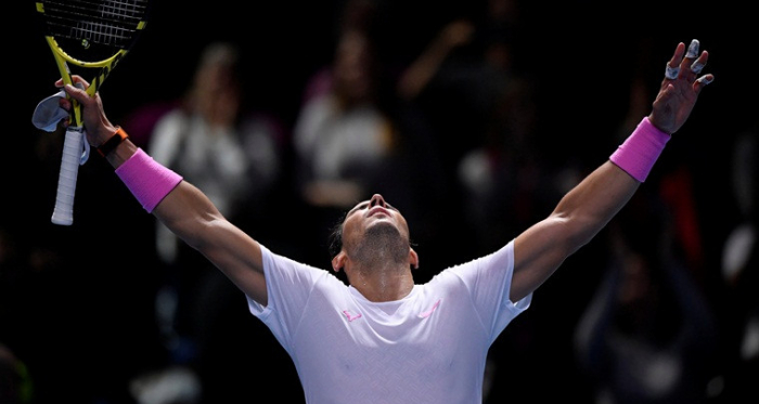 Nadal exults as he celebrates his epic comeback against Medvedev/Photo: Reuters