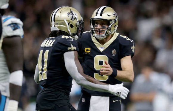 Drew Brees and Alvin Kamara in action against the Panthers (Photo: Jonathan Bachman)