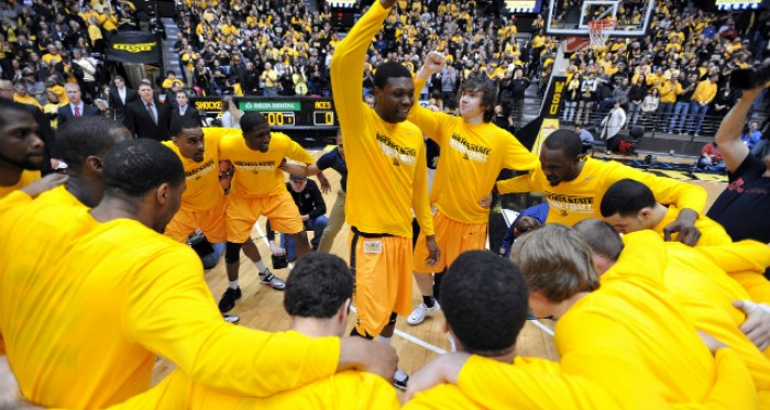 The team huddles up before a game at Charles Koch Arena. Photo courtesy of Peter G, Aiken/USA TODAY Sports.