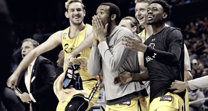UMBC bench reacts to a basket in their upset over No. 1 Virginia. Photo: Gerry Broome/AP.