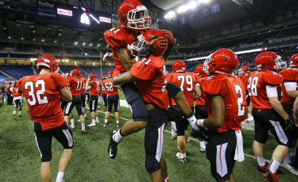 Orchard Lake St. Mary's Josh Mosley (41) celebrates with Chelsea's Joseph Wise (31) in the closing seconds of their 2015 MHSAA Division 5 state final game at Ford Field. (Mike Mulholland | MLive.com)