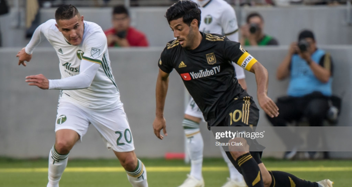 Carlos Vela takes on Portland's David Guzman in LAFC's 4-1 victory: (Getty Images - Shaun Clark)