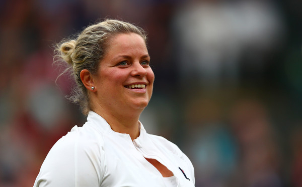 Clijsters partnered John McEnroe in a doubles exhibition under the roof of No.1 Court in May (Image source: Zimbio/Getty Images Europe)