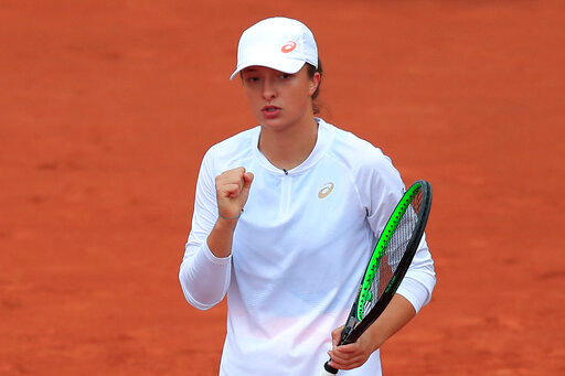 French Open: Iga Swiatek dominates Eugenie Bouchard