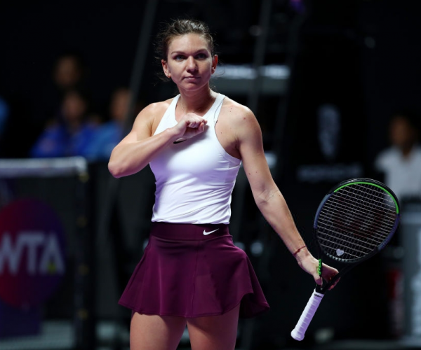 WTA Finals: Resilient Halep saves match point, beats Andreescu