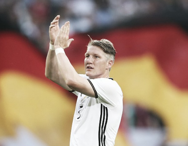Germany captain Bastian Schweinsteiger announces international retirement