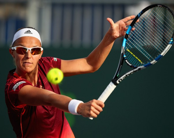 WTA Miami: Kirsten Flipkens Comes From Behind To Win In Straight Sets Against Laura Robson