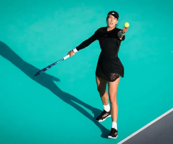 WTA Abu Dhabi: Garbine Muguruza fights past Kristina Mladenovic