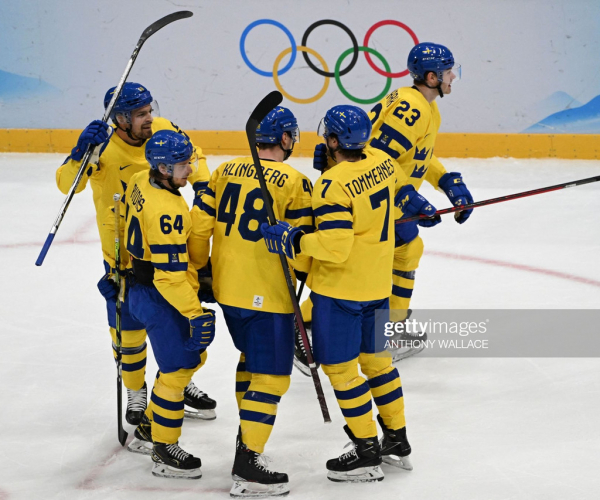 2022 Winter Olympics: Wallmark pair leads Sweden past Latvia