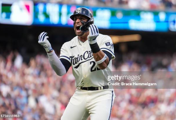 American League Wild Card series Game 1: Lewis homers twice as Twins end playoff skid