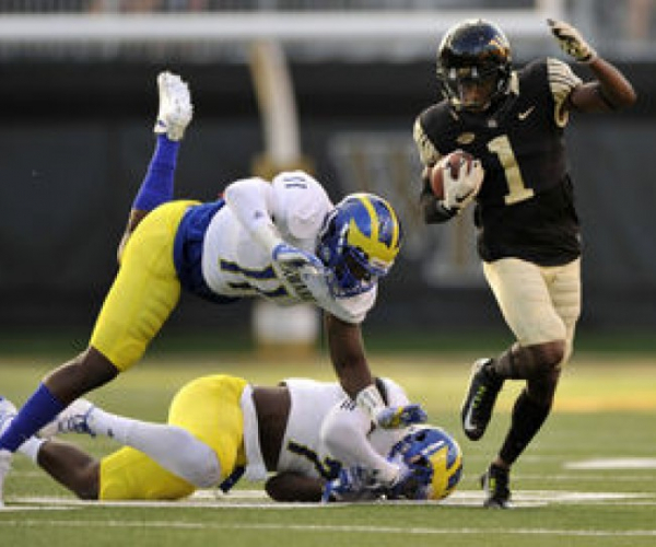 Wake Forest loses Hinton, but beats Delaware 38-21