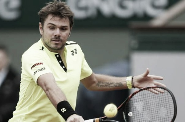 French Open 2016: Defending champion Stan Wawrinka survives early scare to see off Lukas Rosol