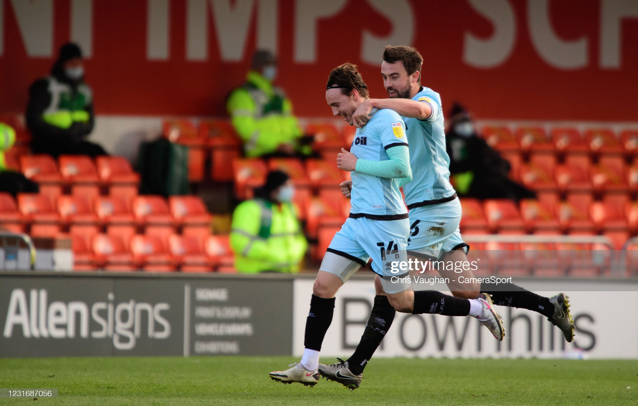 Lincoln City 1-2 Rochdale: Superb Dale climb off the bottom of League One