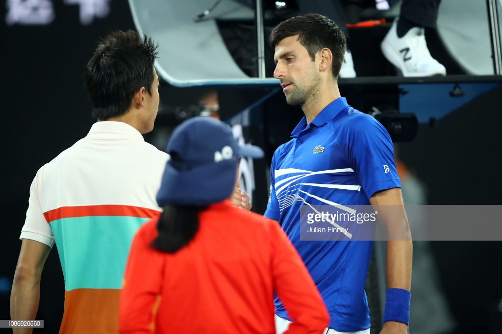 Australian Open: Novak Djokovic seals semifinal place after Kei Nishikori retires 