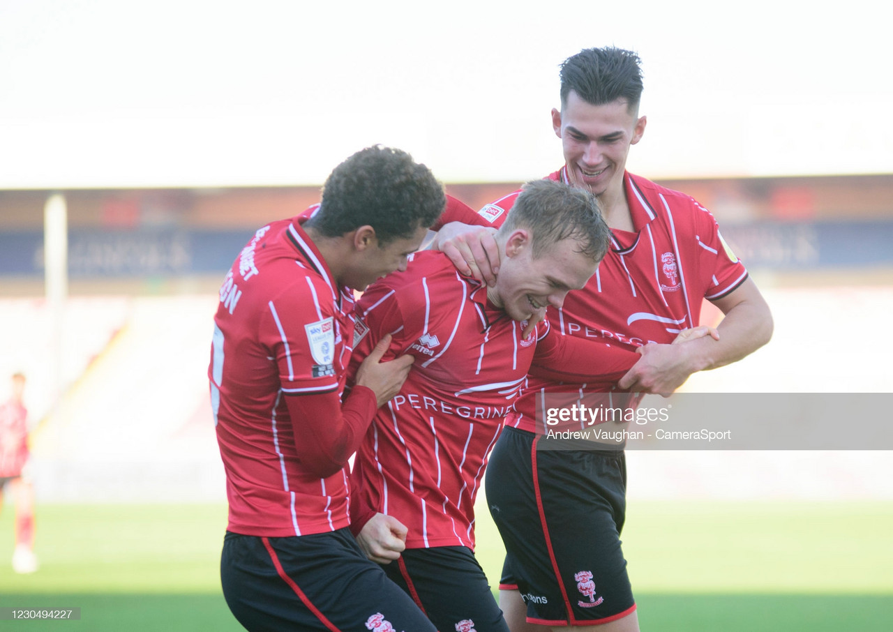 Lincoln City 1-1 Peterborough United: Ten-man Posh hold on for a point