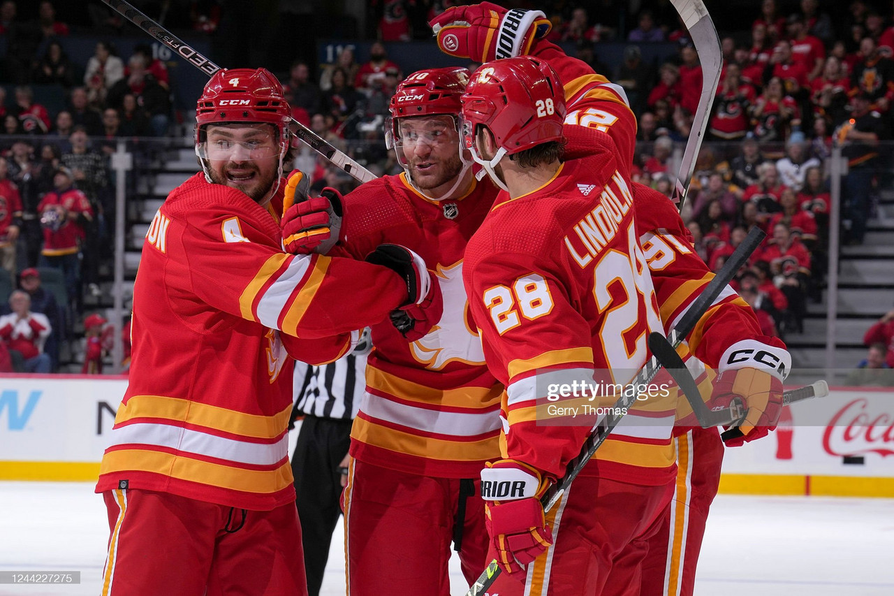 Flames defeat Penguins as Huberdeau scores in team debut