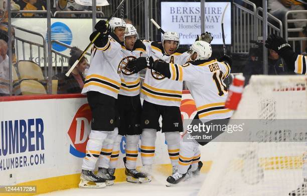 Bruins rally to top Penguins in overtime for sixth straight win