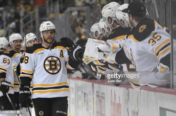 Pastrnak's three goals power Bruins past Penguins, 4-3
