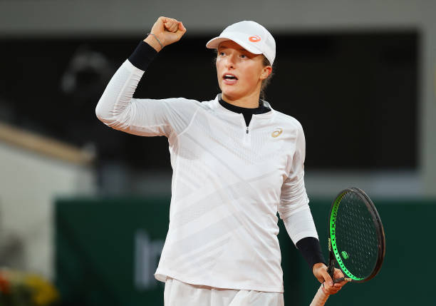 French Open: Iga Swiatek eases past Martina Trevisan to reach first Grand Slam semifinal