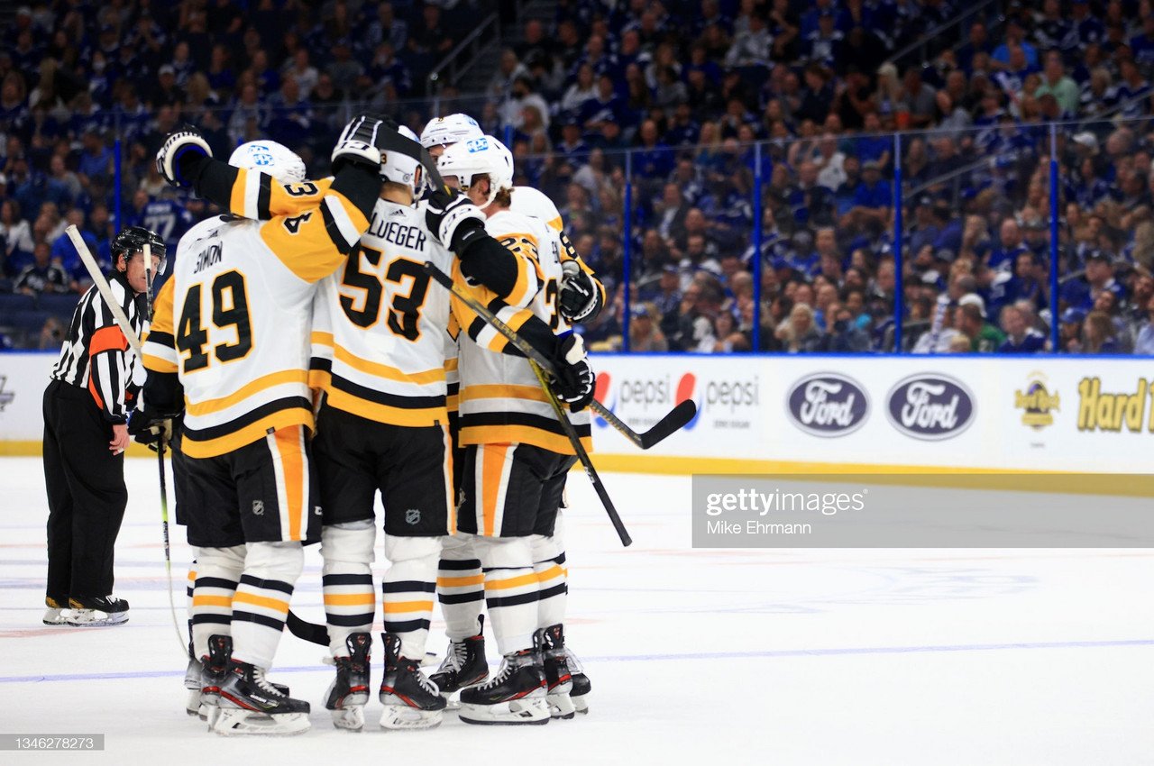 Shorthanded Penguins rout two-time defending champion Lightning on opening night