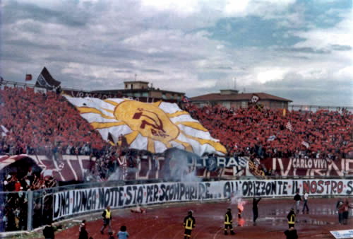 Livorno fans display the Communist Hammer and Sickle
