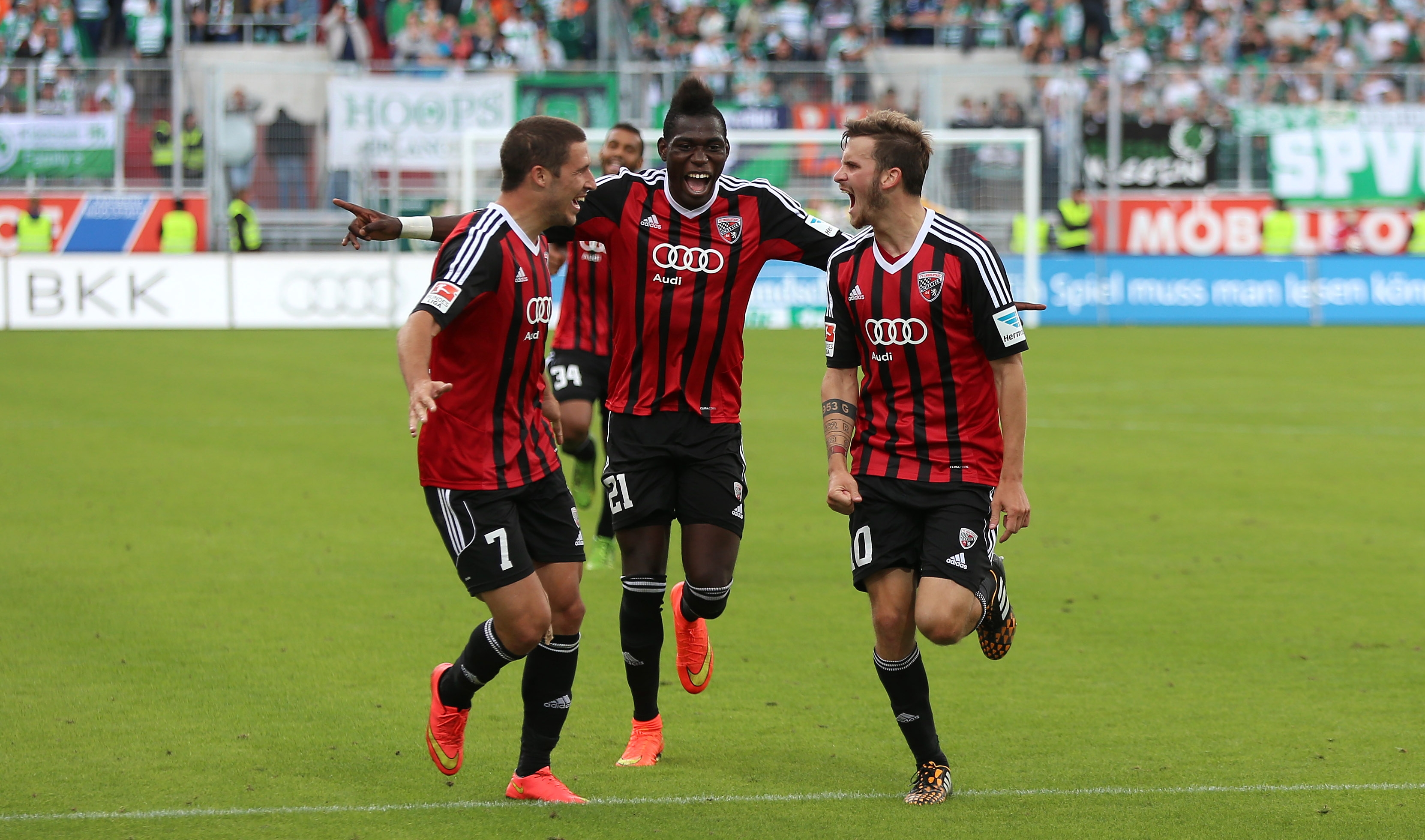 A team effort: Groß celebrates with Danny da Costa and Mathew Leckie. (Credit: FC Ingolstadt)