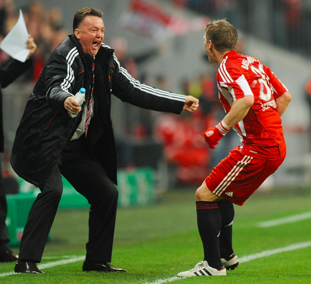 Re-united again: Schweinsteiger celebrates with Van Gaal