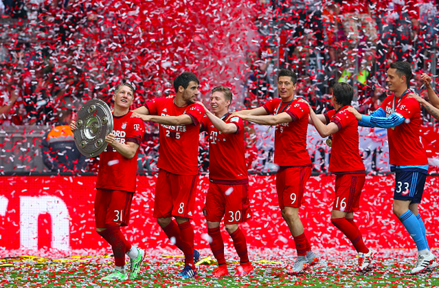 Schweinsteiger leads the celebrations in his final game at the Allianz Arena