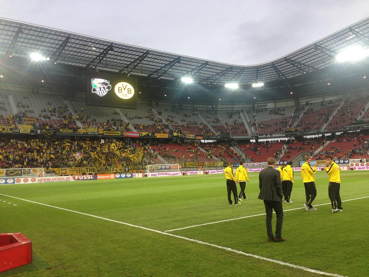 BVB players check out the pitch before the game.